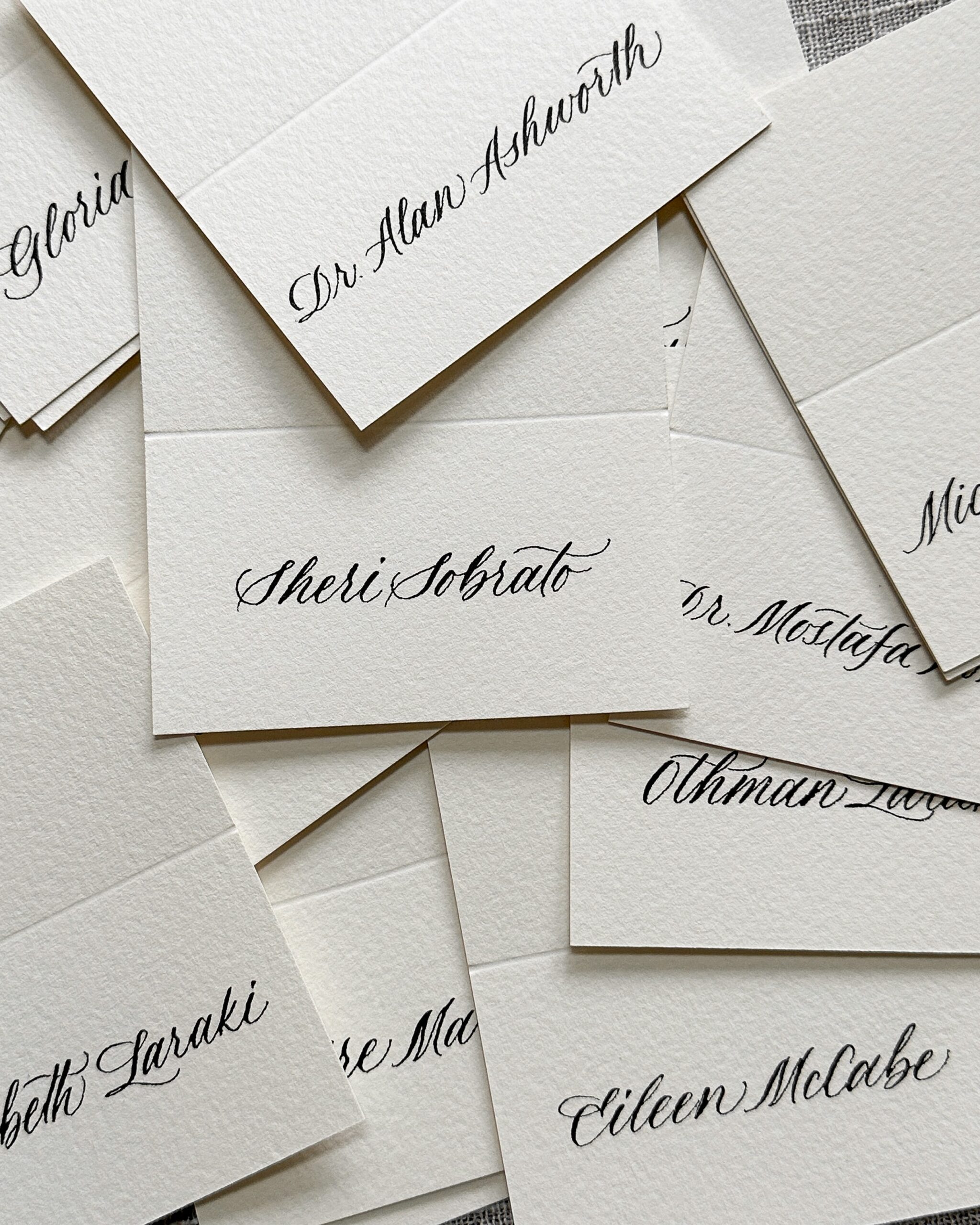 Handwritten calligraphy names place cards