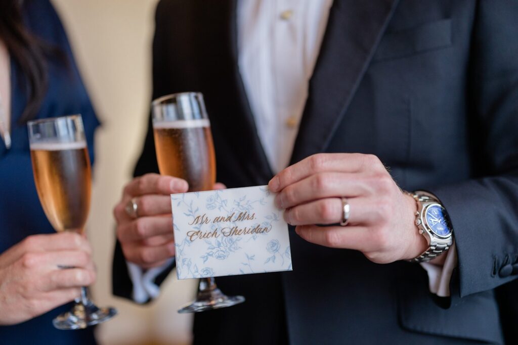 Calligraphy escort card for wedding reception in South San Francisco.