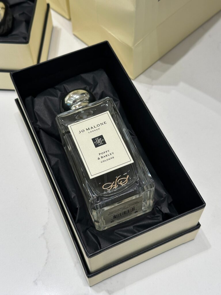 Monogrammed perfume engraving on Jo Malone cologne.