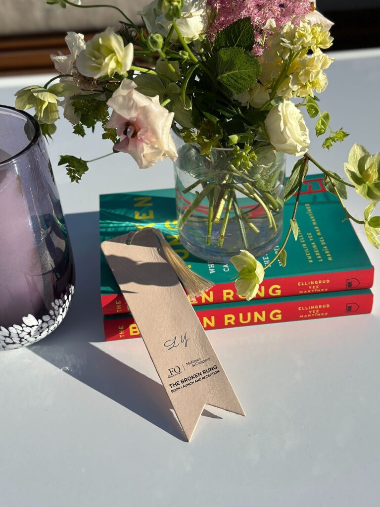 Hot foiled initials on leather bookmarks.