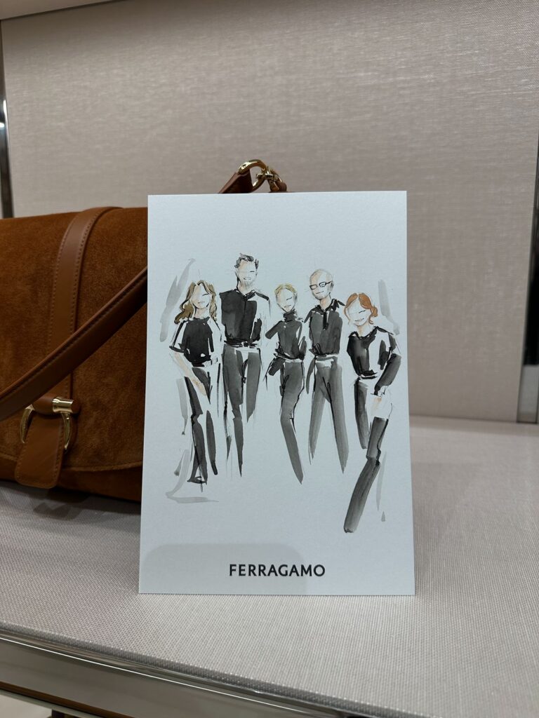 A watercolor illustration of the store staff wearing all black.