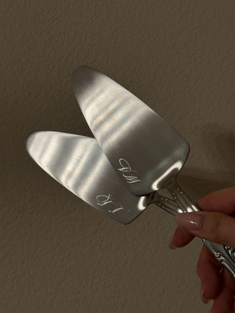 Engraved cake servers prepared for Sweet July PR gifting ahead of product launch.